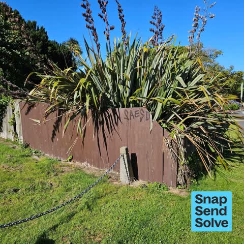 Graffiti on a fence, building or structure — a report photo