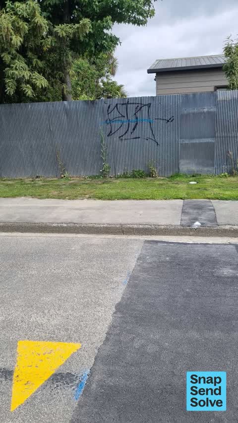 Graffiti on a fence, building or structure, a report photo