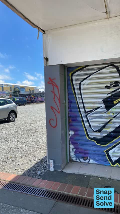 Graffiti on a fence, building or structure — a report photo