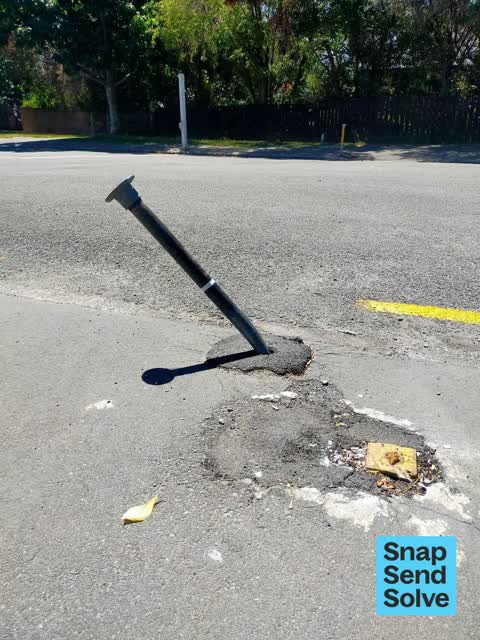 Damaged Street Sign — a report photo