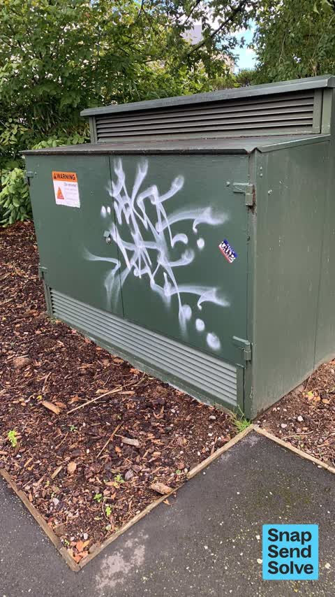 Graffiti on a fence, building or structure, a report photo