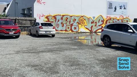 Graffiti on a fence, building or structure, a report photo
