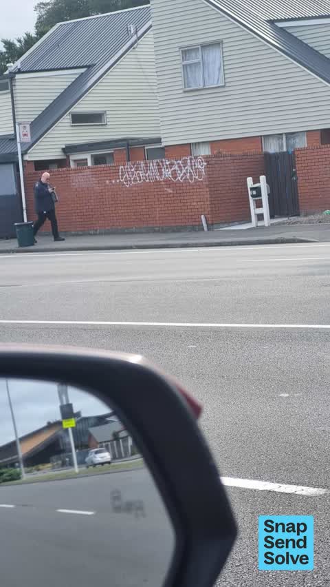 Graffiti on a fence, building or structure, a report photo