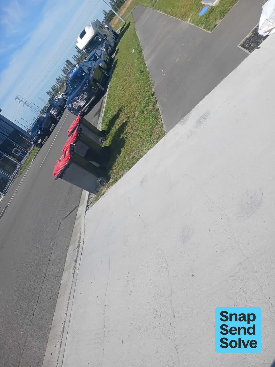 The photograph attached to this rubbish and bins - general report