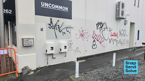 Graffiti on a fence, building or structure — a report photo