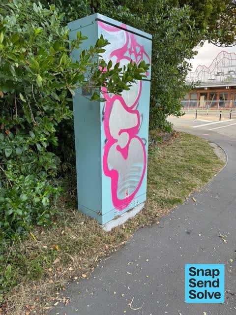 Graffiti on a traffic light pole or cabinet, or wa, a report photo