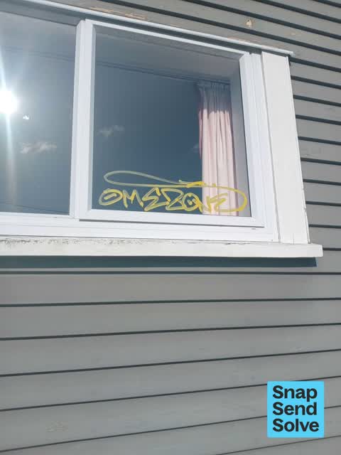 Graffiti on a fence, building or structure, a report photo