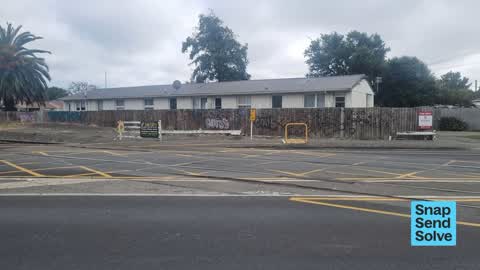 Graffiti on a fence, building or structure, a report photo