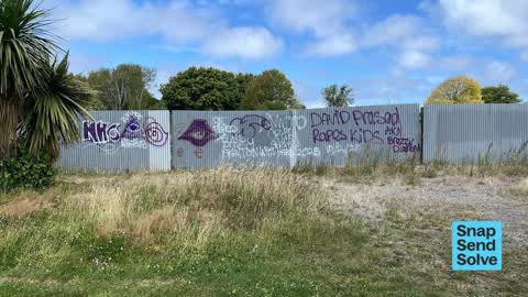 Graffiti on a fence, building or structure — a report photo