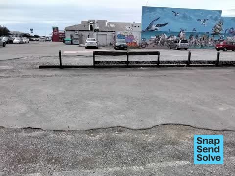 Graffiti on a fence, building or structure, a report photo