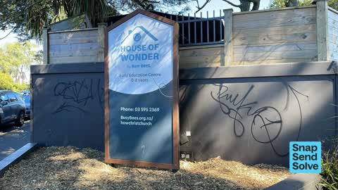 Graffiti on a fence, building or structure, a report photo