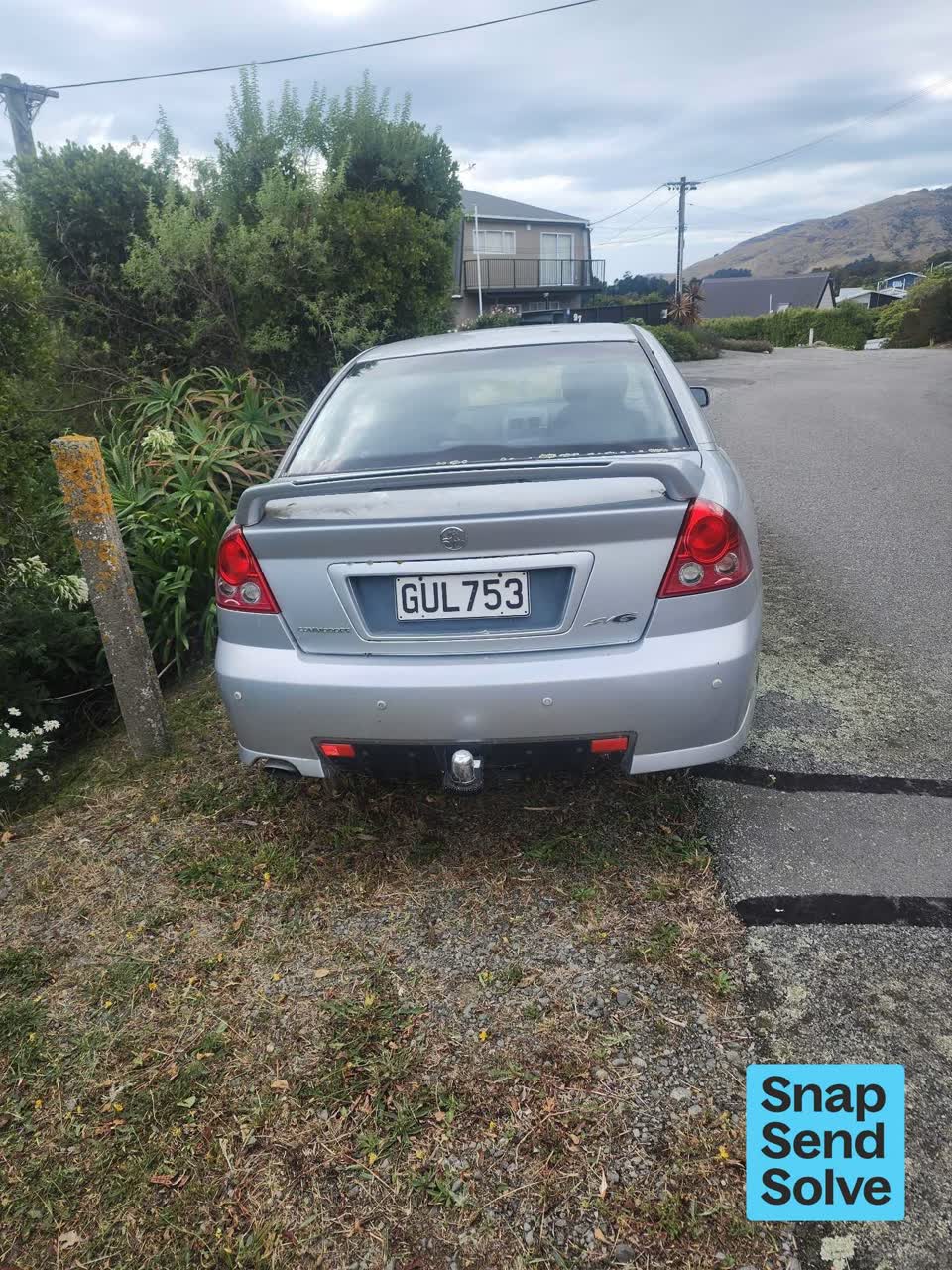 The photograph attached to this abandoned vehicle report