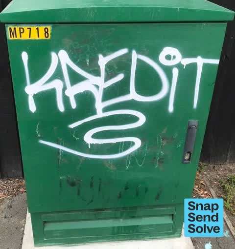 Graffiti on a sign, mural or public art, a report photo
