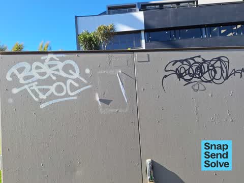 Graffiti on a fence, building or structure, a report photo