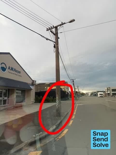 Graffiti on a traffic light pole or cabinet, or wa, a report photo