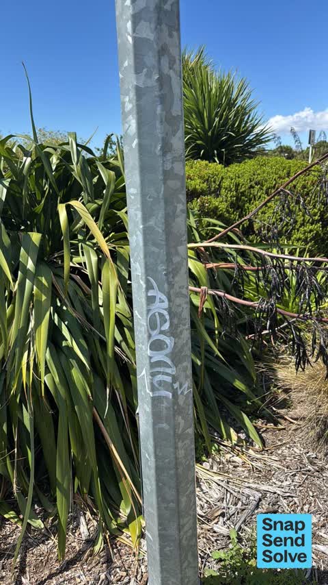 Graffiti on a traffic light pole or cabinet, or wa, a report photo