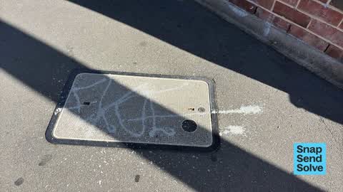 Graffiti on a road, footpath or bridge, a report photo