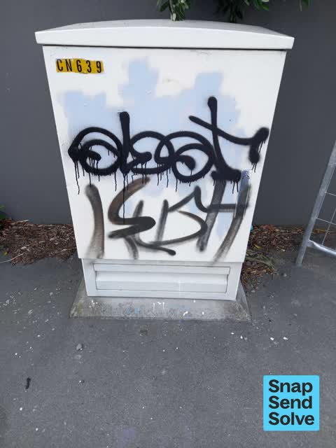 Graffiti on a fence, building or structure — a report photo