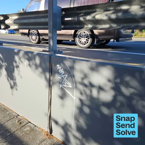 Graffiti on a fence, building or structure — a report photo