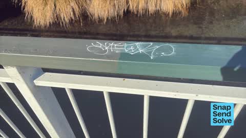 Graffiti on a fence, building or structure, a report photo