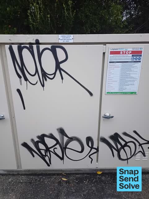 Graffiti on a fence, building or structure, a report photo