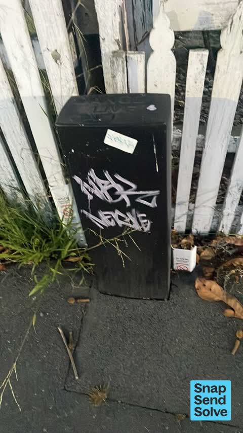 Graffiti on a fence, building or structure, a report photo