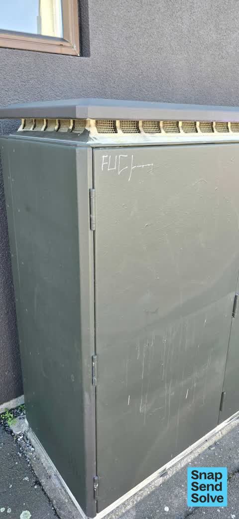 Graffiti on a traffic light pole or cabinet, or wa — a report photo