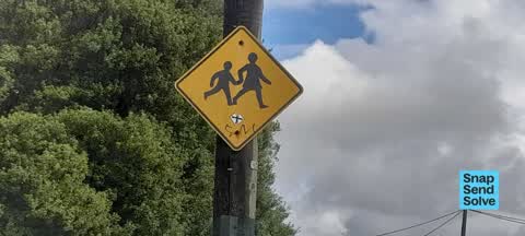 Graffiti on a sign, mural or public art, a report photo