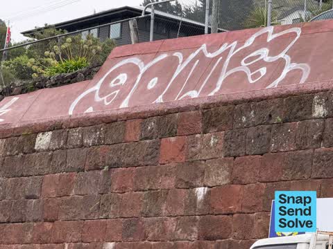 Graffiti on a road, footpath or bridge, a report photo