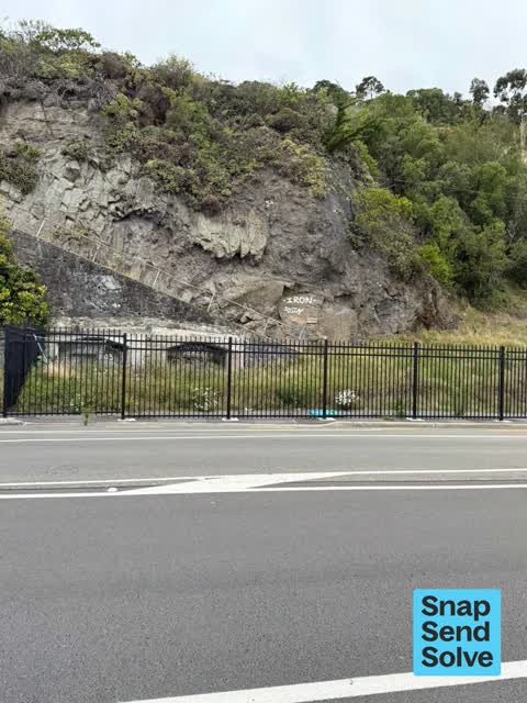 Graffiti on a fence, building or structure, a report photo