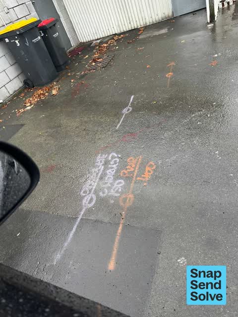 Graffiti on a road, footpath or bridge, a report photo