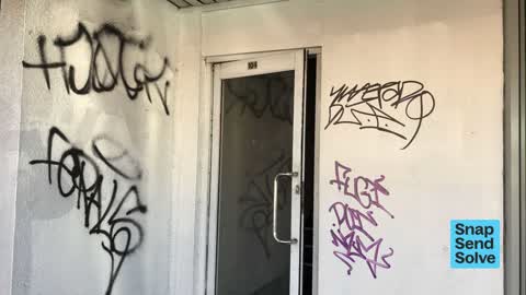 Graffiti on a fence, building or structure — a report photo