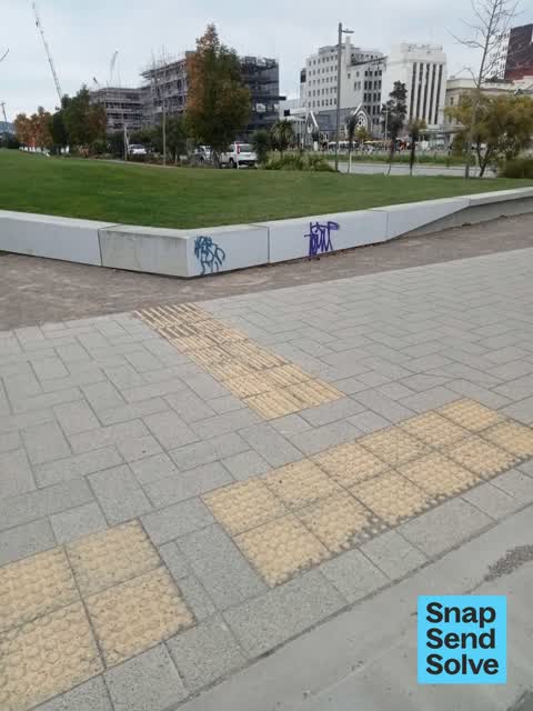 Graffiti on a fence, building or structure, a report photo