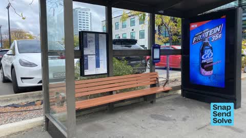 Graffiti on a bus stop or public toilet, a report photo