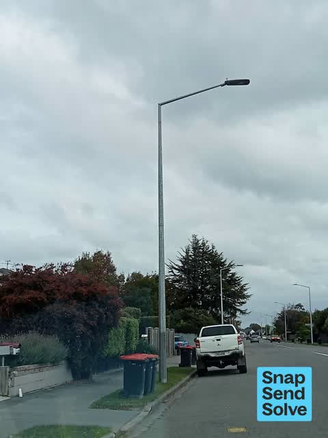 Graffiti on a traffic light pole or cabinet, or wa, a report photo