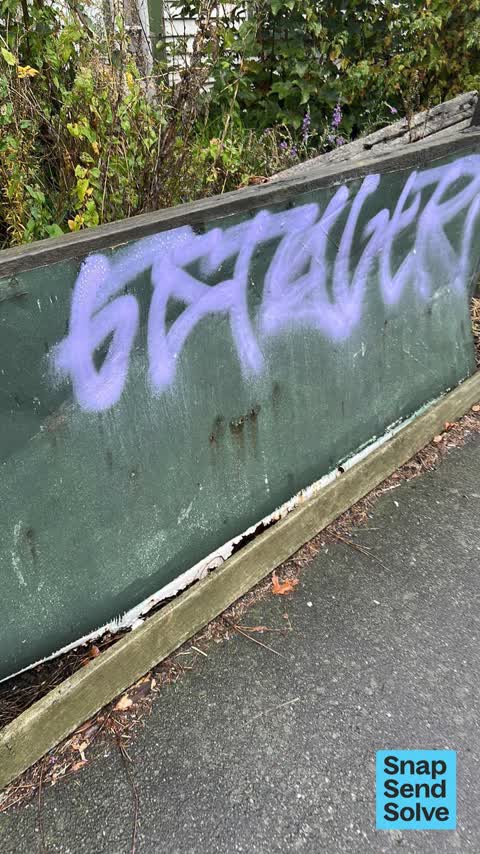 Graffiti on a fence, building or structure, a report photo