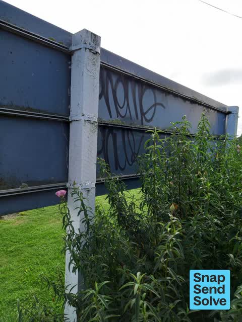 Graffiti on a sign, mural or public art, a report photo