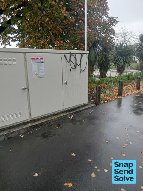 Graffiti on a traffic light pole or cabinet, or wa — a report photo