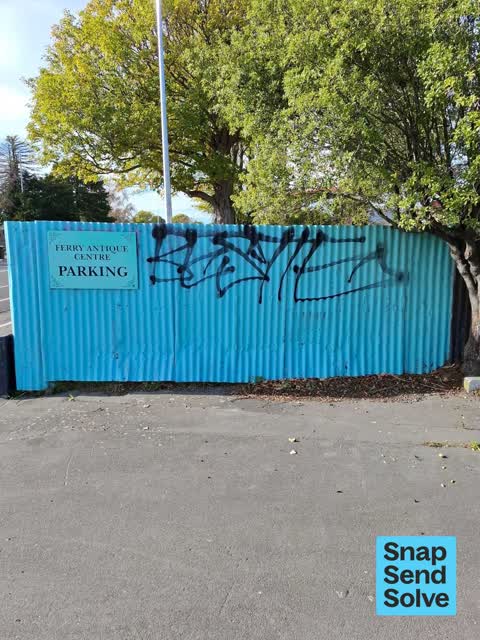 Graffiti on a fence, building or structure — a report photo