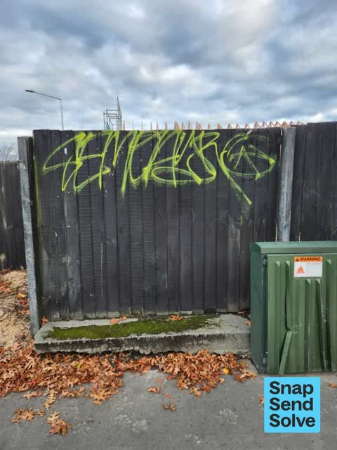 Graffiti on a fence, building or structure — a report photo