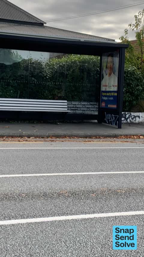 Graffiti on a bus stop or public toilet, a report photo