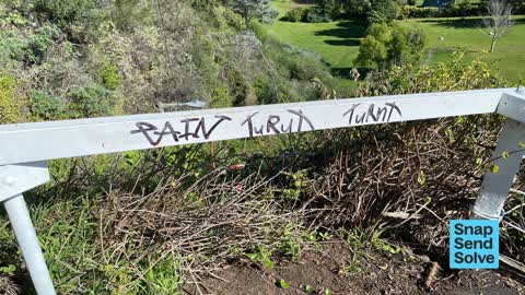 Graffiti on a fence, building or structure, a report photo