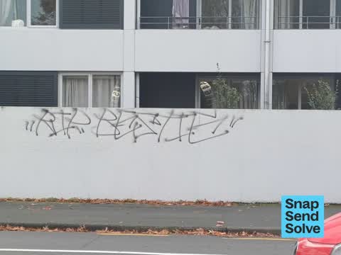 Graffiti on a fence, building or structure, a report photo