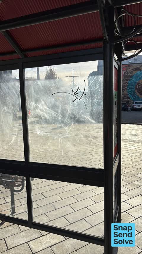 Graffiti on a bus stop or public toilet, a report photo