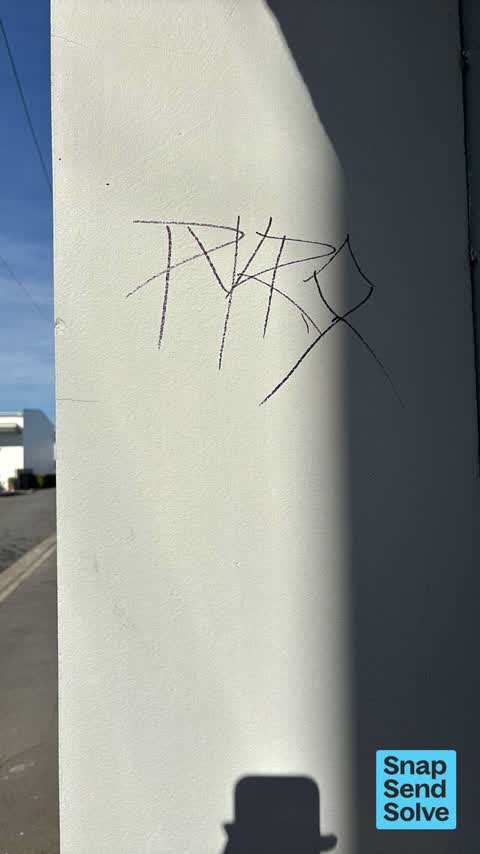 Graffiti on a fence, building or structure — a report photo