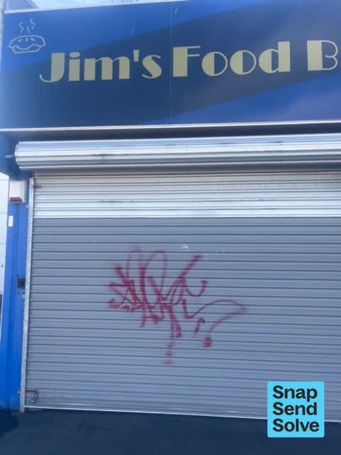 Graffiti on a fence, building or structure, a report photo