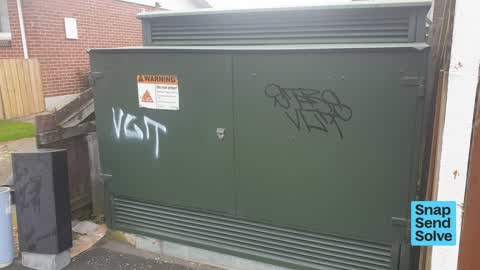 Graffiti on a traffic light pole or cabinet, or wa, a report photo