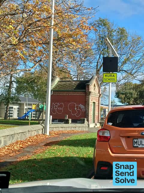 Graffiti on a fence, building or structure — a report photo
