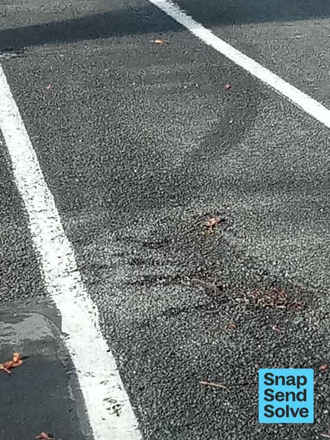 Pothole, a report photo