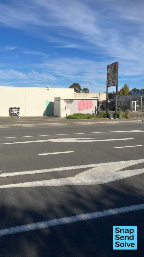 Graffiti on a fence, building or structure — a report photo
